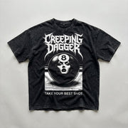 8-Ball Lady Snow Washed Oversized Tee in washed black, natural flat lay with Creeping Dagger graphic and Take Your Best Shot text