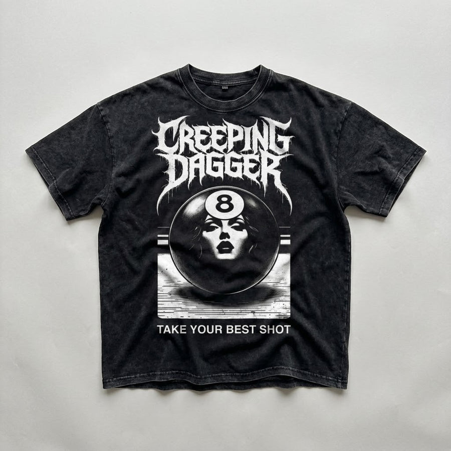 8-Ball Lady Snow Washed Oversized Tee in washed black, natural flat lay with Creeping Dagger graphic and Take Your Best Shot text