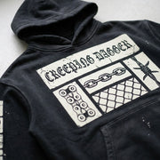 Close-up of the printed artwork on the Creeping Panel Vintage Washed Frayed Hoodie