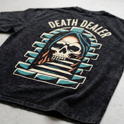 Angled close-up of the Death Dealer back graphic on the Dealer Snow Washed Oversized Tee