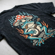 Close-up of the banjo-playing frog back graphic on the Fire Frog Snow Washed Oversized Tee