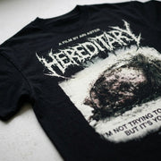 Close-up of the printed artwork on the Hereditary "Your Fault" Standard Tee