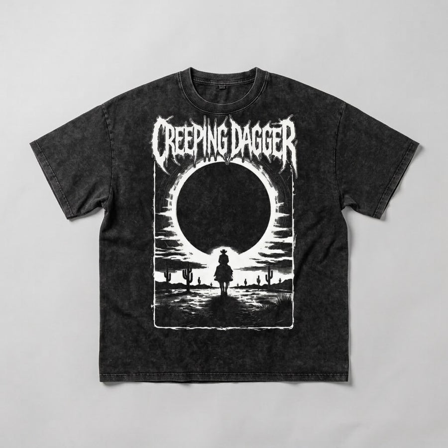 Lone Rider snow-washed black oversized tee laid flat, front graphic