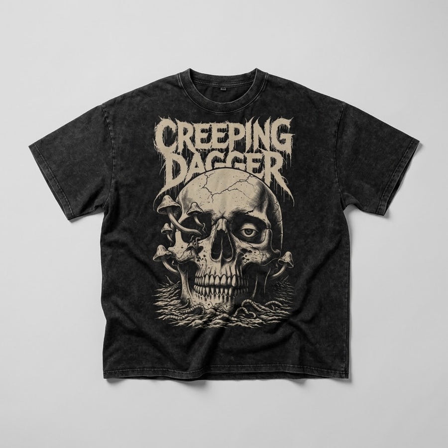 Mushroom Death Snow Washed Oversized Tee in washed black, with Creeping Dagger lettering and mushroom skull front graphic