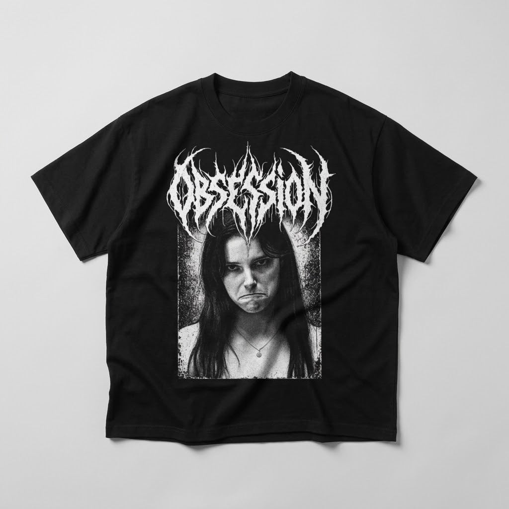 Black Obsession Standard Tee laid flat with natural folds, white lettering and Nikki portrait front graphic