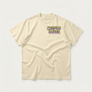 Pimp Wizard standard tee in Cream, front view with Creeping Dagger chest logo