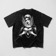 Sacred Mary Snow Washed Oversized Tee, back with Mary holding a flaming heart on washed black cotton