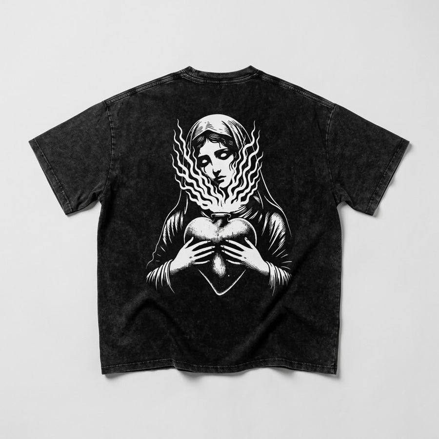 Sacred Mary Snow Washed Oversized Tee, back with Mary holding a flaming heart on washed black cotton