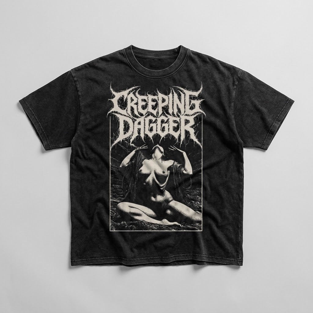 Suffering Moon Snow Washed Oversized Tee in washed black laid flat, with Creeping Dagger logo and seated figure graphic